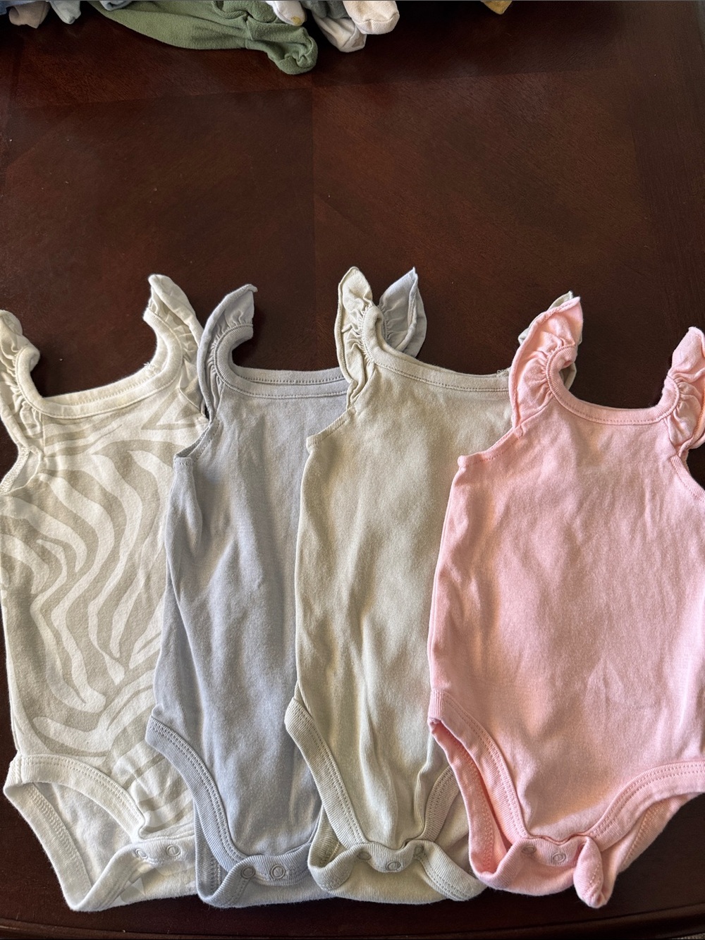 The Honest Company Pink and Neutral Ruffle-Shoulder One-Piece Bodysuit Set